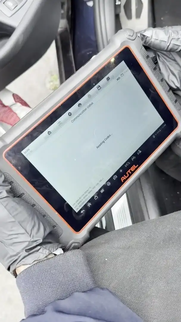 An Autel scan tool reading live fault codes from a BMW at Beacon Auto Care San Mateo — how we diagnose a symptom before quoting