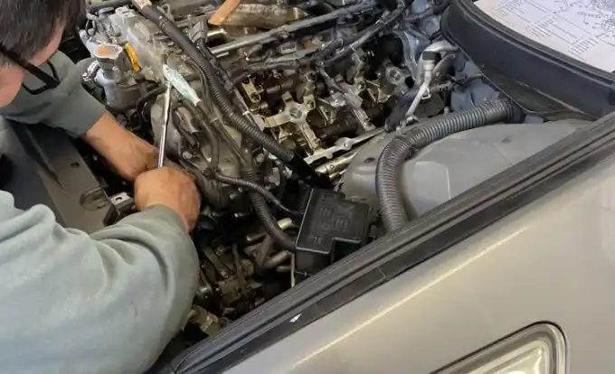 Valve-cover gasket replacement on a VQ-engine Infiniti at Beacon Auto Care San Mateo