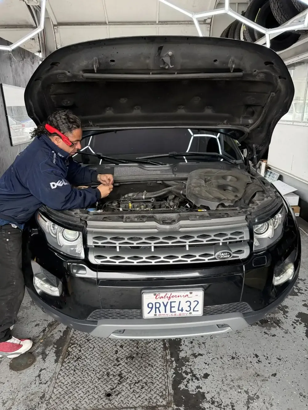Favio diagnosing a Land Rover AC issue at Beacon Auto Care San Mateo