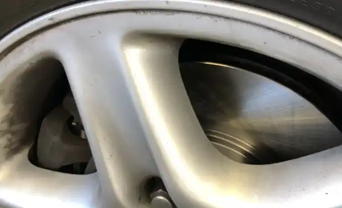 A new brake rotor and pads installed on a Lexus at Beacon Auto Care San Mateo