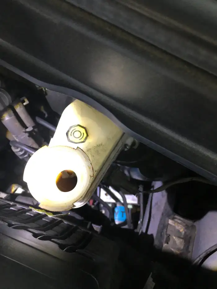 Brake fluid reservoir with dark contaminated fluid on a 2013 Hyundai Sonata during a digital vehicle inspection in San Mateo