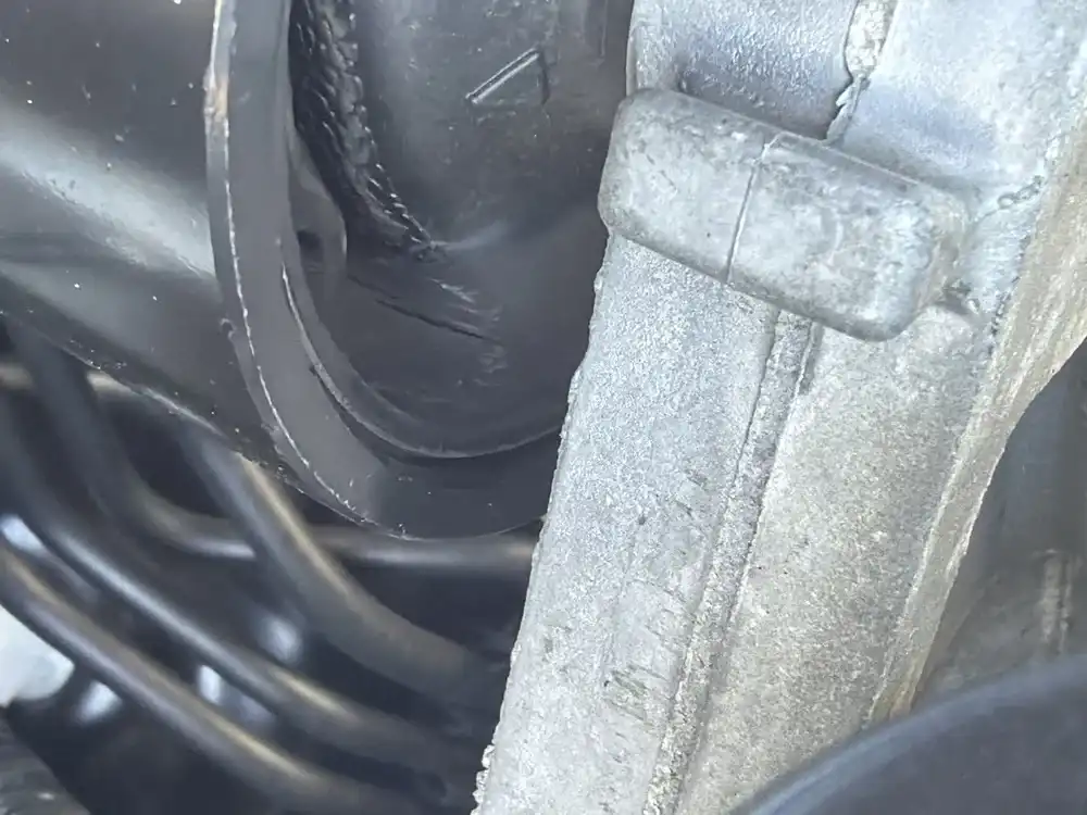 Torn engine motor mount found during engine repair inspection at Beacon Auto Care San Mateo