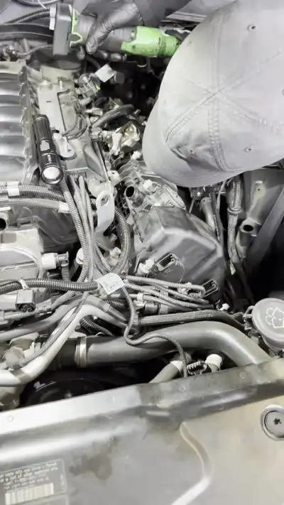 BMW V8 throttle and intake being cleaned with spray cleaner — shop clip thumbnail